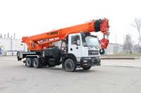 KrAZ manufactured the first 40-ton truck crane